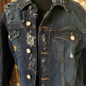 Distressed ladies denim jacket with sunflower and butterflies